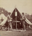 7th New York Infantry soldiers being briefed by an officer in front of his tent. The 7th Infantry was also known as the "Steuben Guard." 