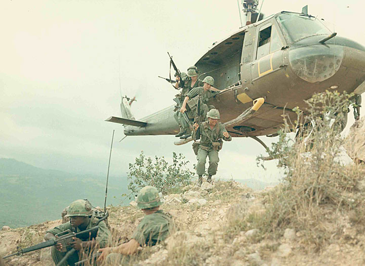 Soldiers of Troop 3, 1st Recon Squadron, 9th Cavalry, 1st Cavalry Division (Airmobile) dispatch from a UH-1D helicopter on a search and destroy mission.